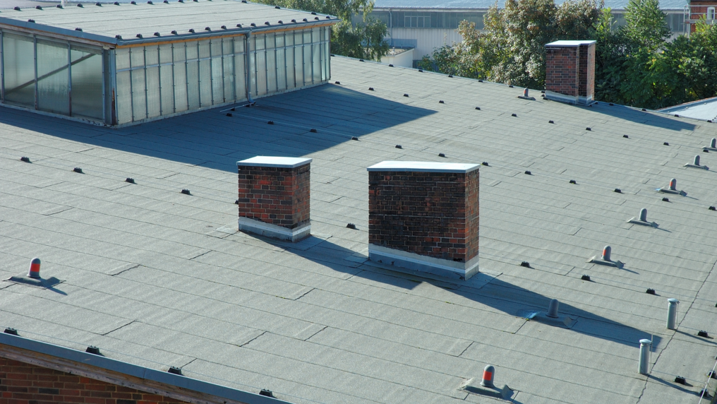 Commercial building roof and chimneys