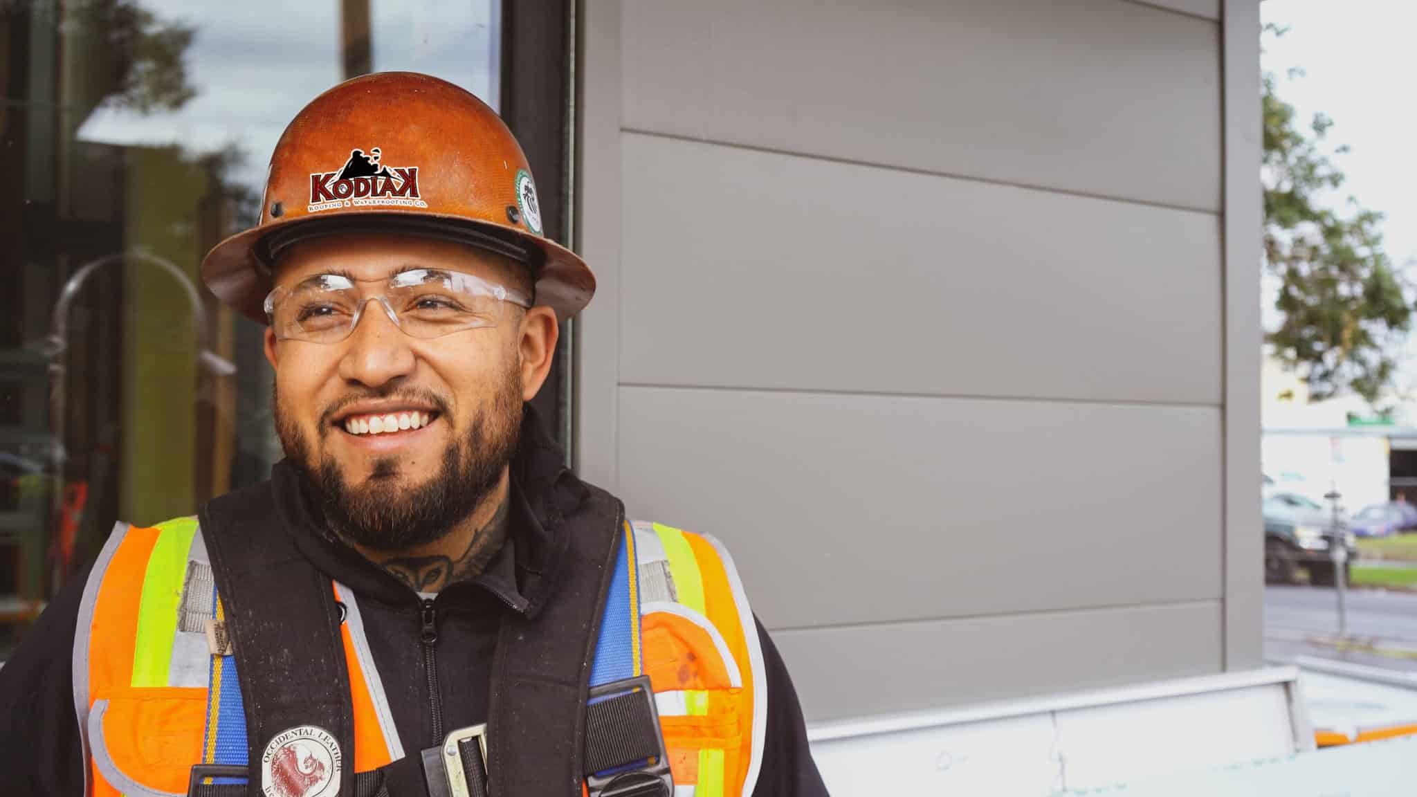 Smiling Kodiak employee wearing a hard hat, representing top-quality roofing, solar, and waterproofing services in Jackson. Trust Kodiak for all your 'Roofing Near Me,' 'Solar Near Me,' and 'Waterproofing Near Me' needs. Experts in re-roofing, metal roofing, solar installation, and comprehensive waterproofing solutions. Keywords: Jackson roofing services, Commercial roofing Jackson, Residential solar installation Jackson, Jackson waterproofing solutions, Roof repair Jackson, Solar energy systems Jackson, Waterproofing contractors Jackson, Roof maintenance Jackson, Solar panel installation Jackson, Roofing and waterproofing Jackson. Roofing Amador City, Roofing Ione, Roofing Jackson, Roofing Plymouth, Roofing Sutter Creek, Roofing Angels Camp, Roofing Antioch, Roofing Brentwood, Roofing Clayton, Roofing Concord, Roofing Danville, Roofing El Cerrito, Roofing Hercules, Roofing Lafayette, Roofing Martinez, Roofing Moraga, Roofing Oakley, Roofing Orinda, Roofing Pinole, Roofing Pittsburg, Roofing Pleasant Hill, Roofing Richmond, Roofing San Pablo, Roofing San Ramon, Roofing Walnut Creek, Roofing Placerville, Roofing South Lake Tahoe, Roofing Clearlake, Roofing Lakeport, Roofing American Canyon, Roofing Calistoga, Roofing Napa, Roofing St. Helena, Roofing Yountville, Roofing Grass Valley, Roofing Nevada City, Roofing Truckee, Roofing Auburn, Roofing Colfax, Roofing Lincoln, Roofing Loomis, Roofing Rocklin, Roofing Roseville, Roofing Citrus Heights, Roofing Elk Grove, Roofing Folsom, Roofing Galt, Roofing Isleton, Roofing Rancho Cordova, Roofing Sacramento, Roofing Escalon, Roofing Lathrop, Roofing Lodi, Roofing Manteca, Roofing Ripon, Roofing Stockton, Roofing Tracy, Roofing Benicia, Roofing Dixon, Roofing Fairfield, Roofing Rio Vista, Roofing Suisun City, Roofing Vacaville, Roofing Vallejo, Roofing Ceres, Roofing Hughson, Roofing Modesto, Roofing Newman, Roofing Oakdale, Roofing Patterson, Roofing Riverbank, Roofing Turlock, Roofing Waterford, Roofing Live Oak, Roofing Yuba City, Roofing Davis, Roofing West Sacramento, Roofing Winters, Roofing Woodland, Roofing Marysville, Roofing Wheatland, Roofing Carson City, Roofing Gardnerville, Roofing Genoa, Roofing Minden, Roofing Fernley, Roofing Yerington, Roofing Dayton, Roofing Silver Springs, Roofing Smith Valley, Roofing Stagecoach, Roofing Virginia City, Roofing Lockwood, Roofing Reno, Roofing Sparks, Roofing Incline Village, Roofing Sun Valley, Roofing Cold Springs, Roofing Spanish Springs, Roofing Lemmon Valley.