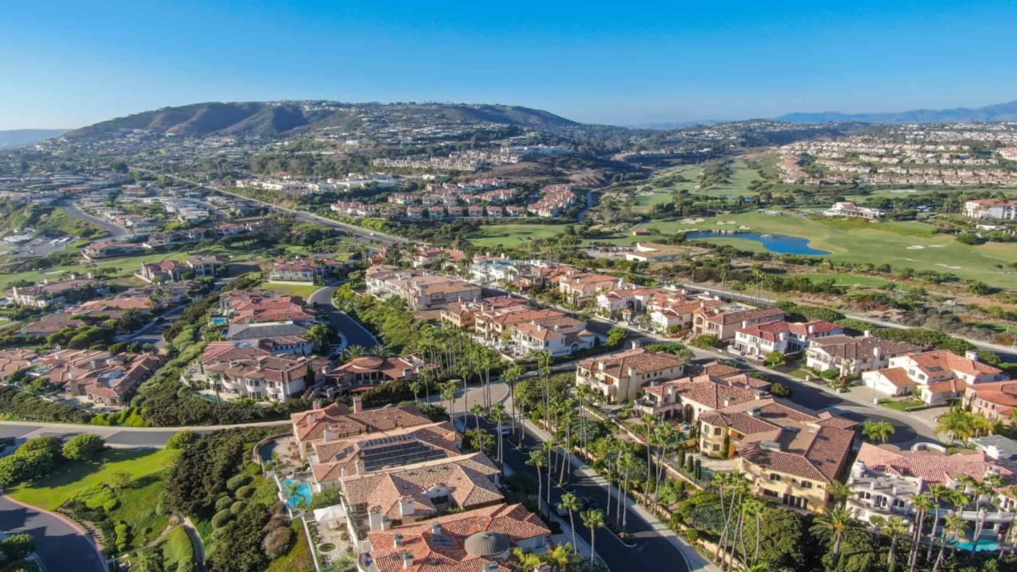 A breathtaking aerial view of a luxury residential area in Loomis, California, surrounded by green hills and a golf course. This image highlights the upscale community that benefits from Kodiak Roofing & Waterproofing's premier commercial roofing, waterproofing, and solar installation services, ensuring durability and sustainability for local properties.

Loomis, California, commercial roofing, roofing services, waterproofing, solar installation, Kodiak Roofing, aerial view, luxury homes, residential community, roofing maintenance, re-roofing, emergency roof repair, sustainable roofing, energy efficiency, metal roofing, property protection, California roofing contractor, Loomis neighborhood.